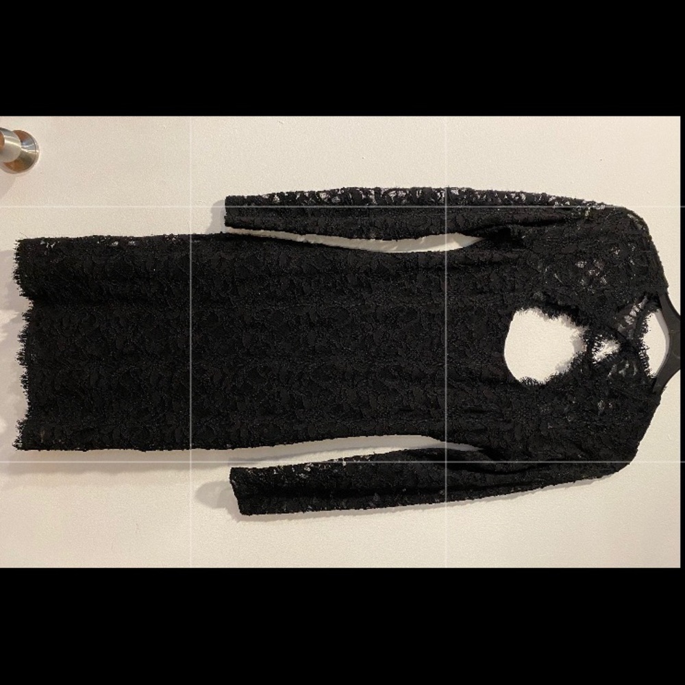 Woman’s black lace bodycon -below knees length